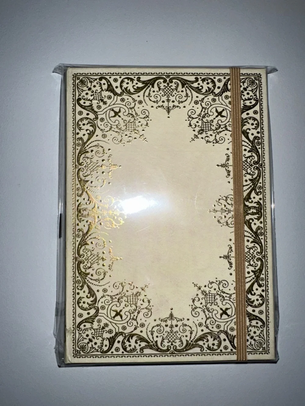 Gilded Ivory gold-foiled embossed cover gilded pages elastic closure journal